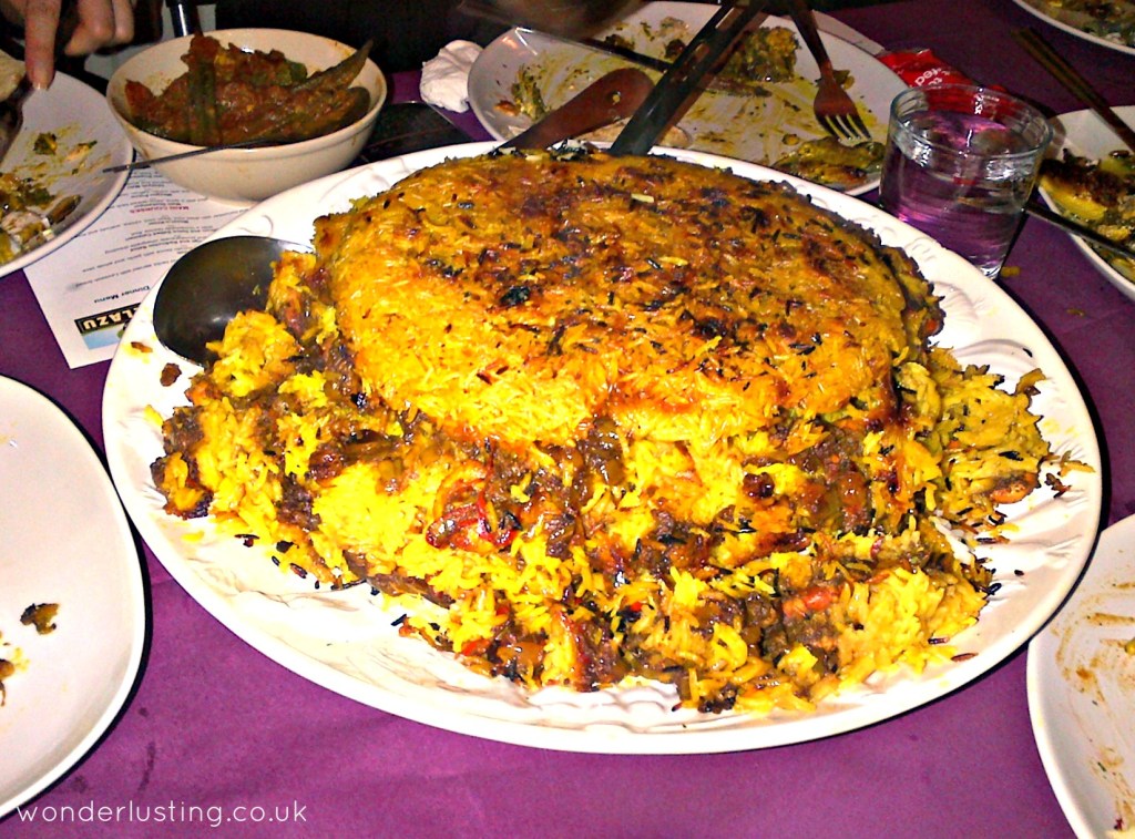Maygoo Polow: Spicy shrimp rice with raisins and tadig (the crunchy rice layer)