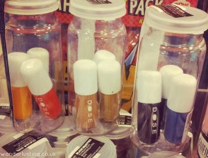 DOSE nail polish bottles