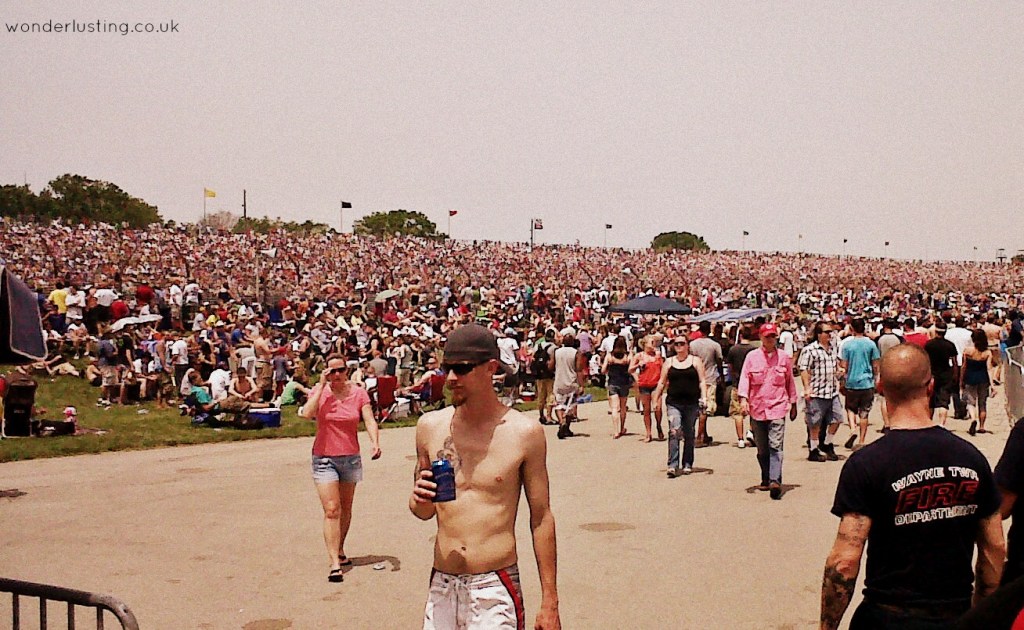 People fill the fields as far as the eye can see