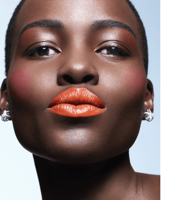 Lupita Nyong'o in Orange Lipstick Essence magazine