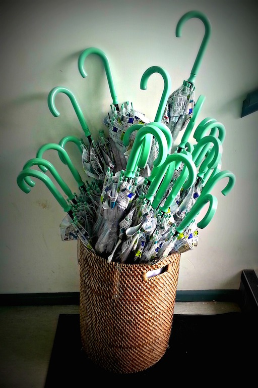 I love that John Lewis is realistic about London. They provide umbrellas too!