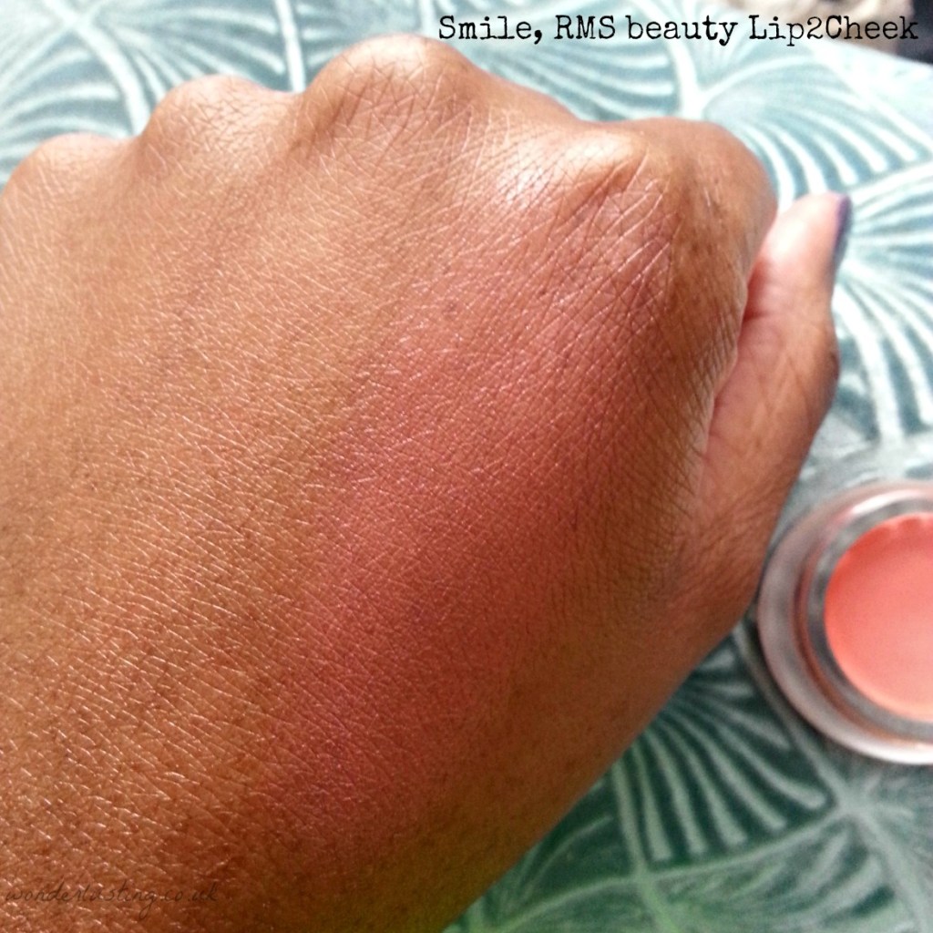 Smile, RMS lip2cheek swatch on dark skin