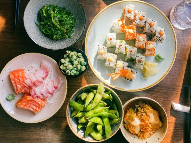 Unlimited seaweed salad, kimchi, wasabi peas, edamame, sushi, sashimi